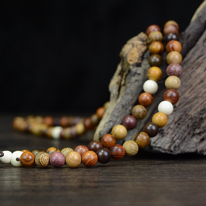 Buddha Stones Mala a energia calmante in legno naturale multicolore con 108 perle. - image 3