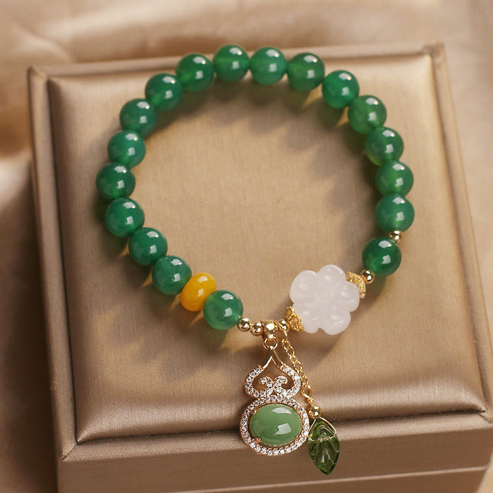 Buddha Stones Braccialetto di supporto con ciondolo a forma di foglia di zucca, fiori di zucca e agata verde e giada bianca. - image 1