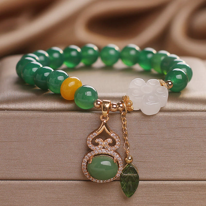 Buddha Stones Braccialetto di supporto con ciondolo a forma di foglia di zucca, fiori di zucca e agata verde e giada bianca. - image 8