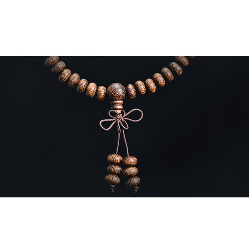 Buddha Stones Mala con 108 perline di legno testurizzate per un'energia calmante - image 10