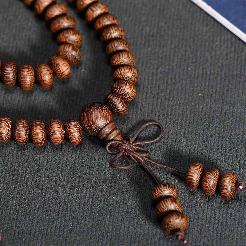 Buddha Stones Mala con 108 perline di legno testurizzate per un'energia calmante - image 7