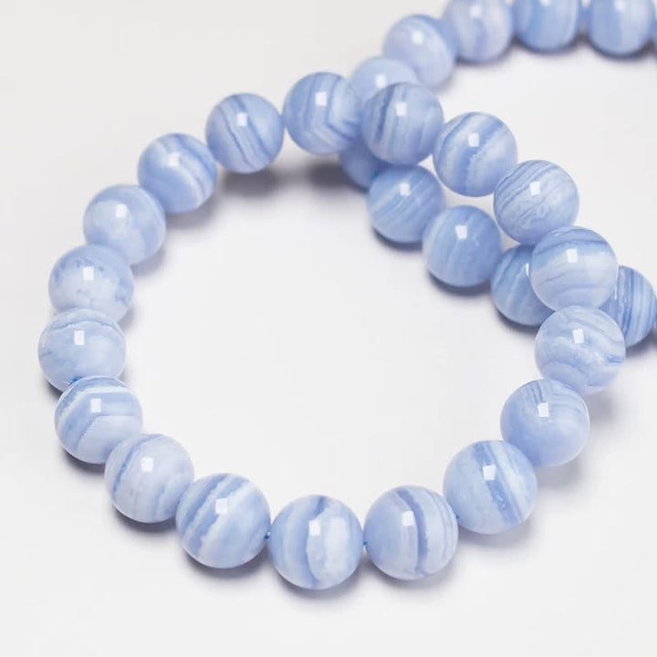 Buddha Stones Bracciale rotondo con perline di agata blu naturale. - image 1