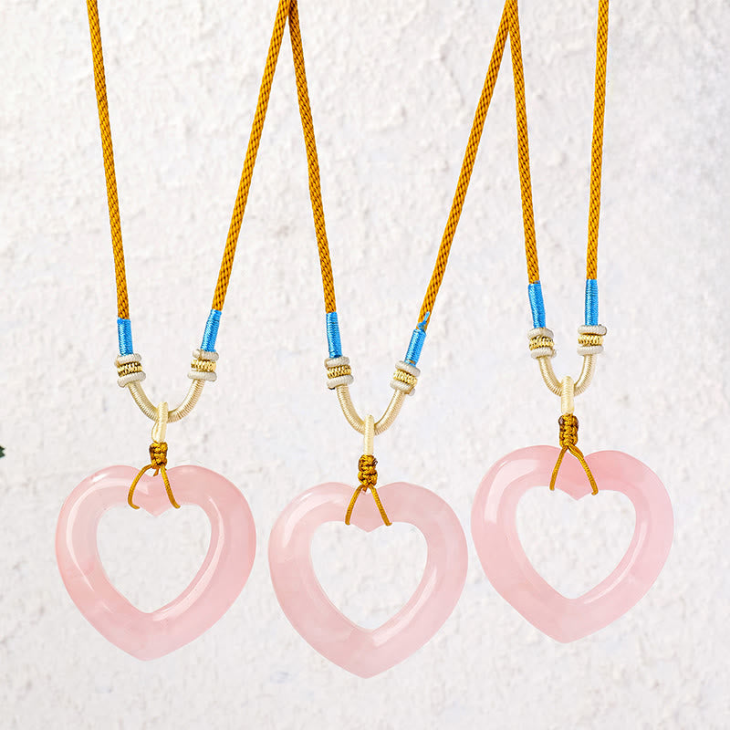 Buddha Stones Collana con ciondolo a forma di cuore cavo in quarzo rosa naturale. - image 0