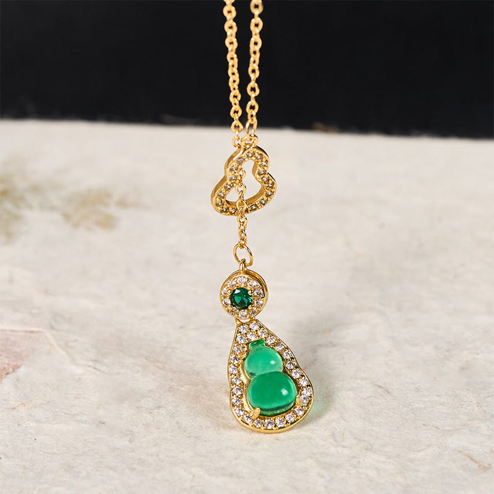 Collana con ciondolo a forma di bilancia in rame e zucca colorata con design cavo Buddha Stones. - image 3