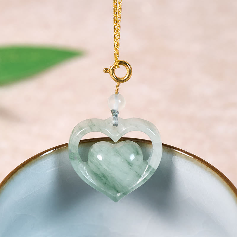 Buddha Stones Collana con ciondolo a forma di cuore vuoto in giada con abbondanza - Giada naturale dorata (colore e dimensioni possono variare) - image 0