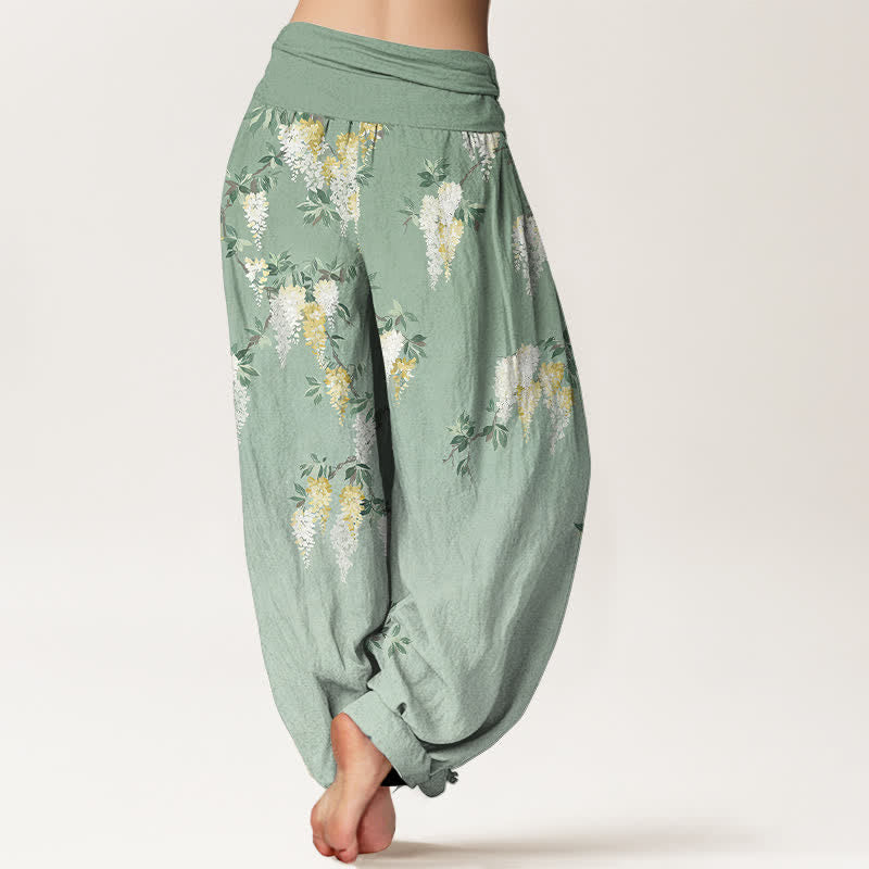 Buddha Stones Pantaloni harem da donna in puro cotone bianco con motivo a grappolo di fiori gialli e elastico in vita - image 1
