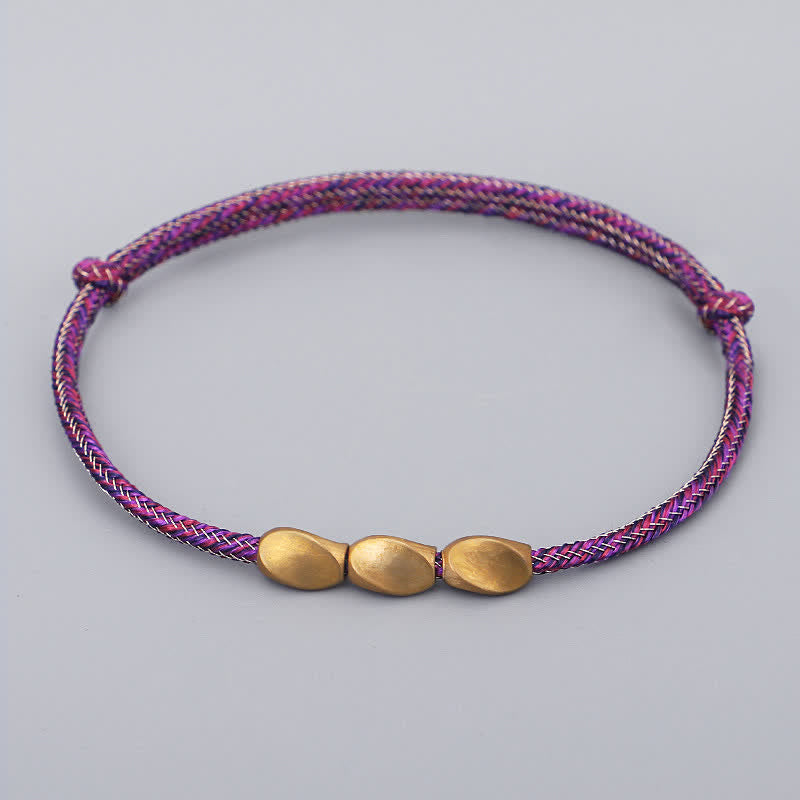 Buddha Stones Bracciale con perline di rame dorato e filo multicolore. - Rosa scuro - image 4