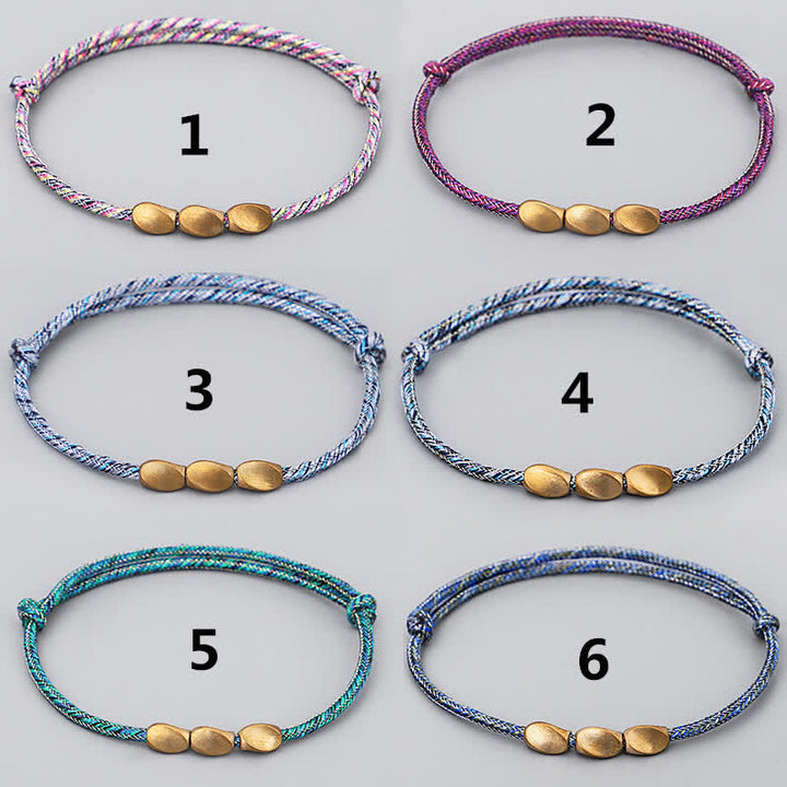 Buddha Stones Bracciale con perline di rame dorato e filo multicolore. - image 14