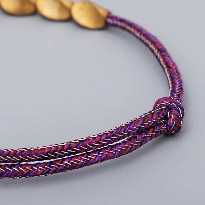 Buddha Stones Bracciale con perline di rame dorato e filo multicolore. - image 5