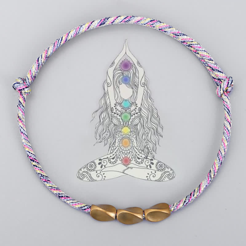 Buddha Stones Bracciale con perline di rame dorato e filo multicolore. - image 1