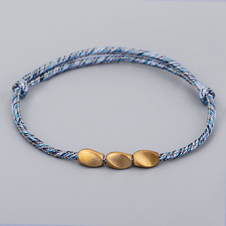 Buddha Stones Bracciale con perline di rame dorato e filo multicolore. - Blu - image 7
