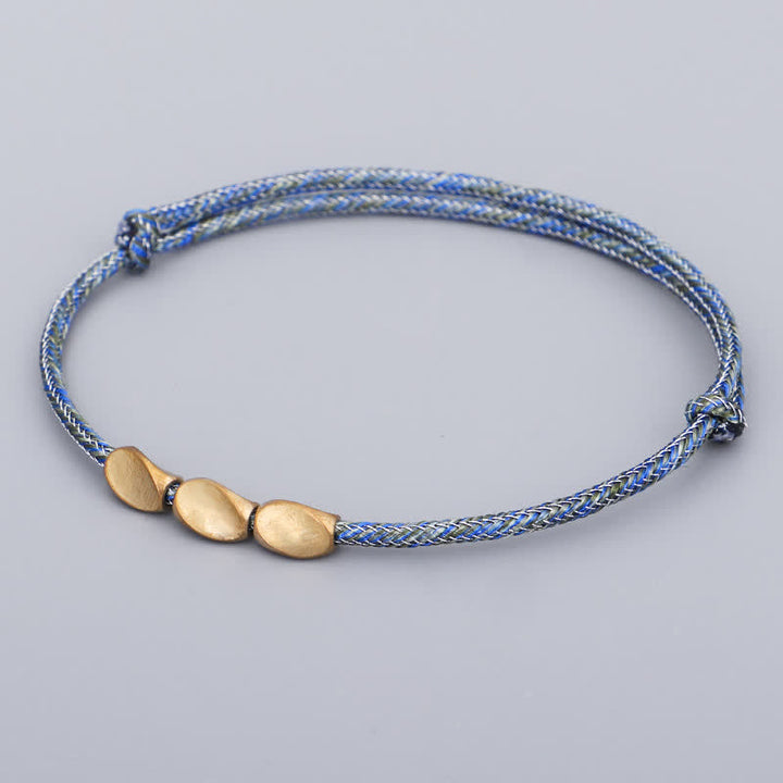 Buddha Stones Bracciale con perline di rame dorato e filo multicolore. - image 11