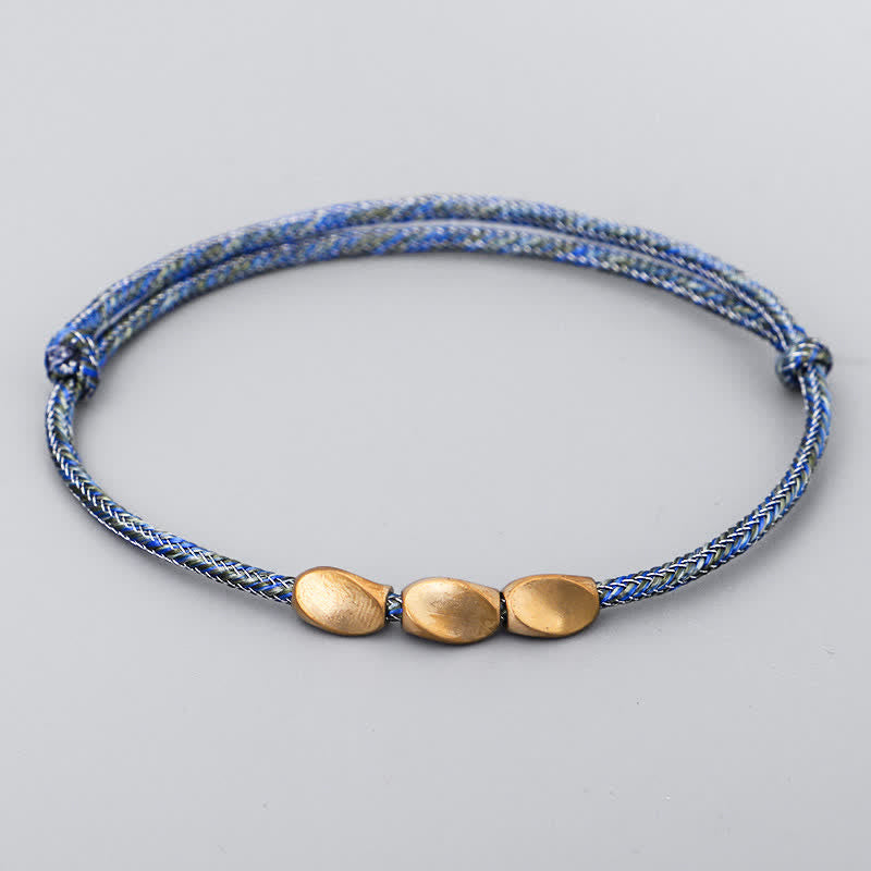 Buddha Stones Bracciale con perline di rame dorato e filo multicolore. - Blu scuro - image 10