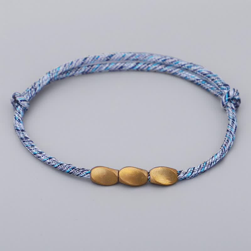 Buddha Stones Bracciale con perline di rame dorato e filo multicolore. - Blu celeste - image 6