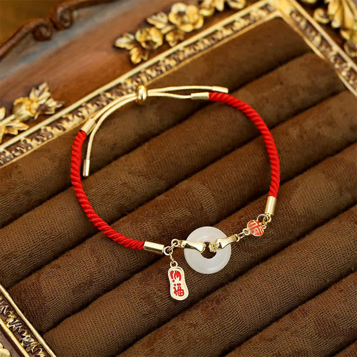 Buddha Stones Braccialetto portafortuna intrecciato con giada bianca e filo rosso, con carattere Fu. - Giada bianca - image 0