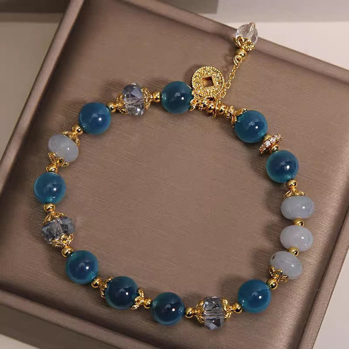 Buddha Stones Bracciale con bilancia a moneta in rame e agata blu naturale Candy Agate. - image 1