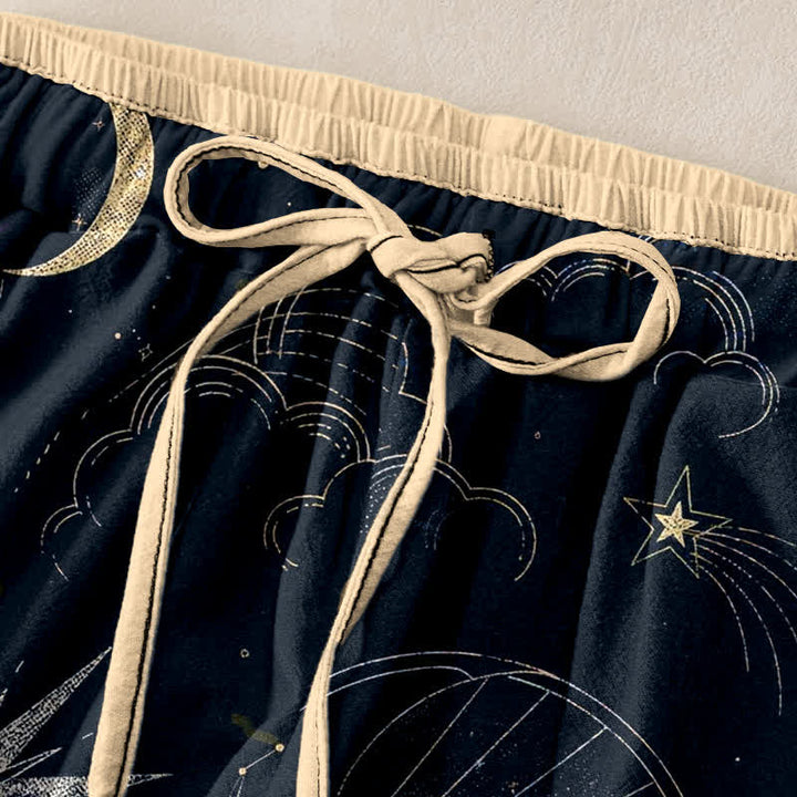 Buddha Stones Pantaloni da donna in puro cotone con elastico in vita e tasche, fantasia celeste sole, luna e stelle. - image 1