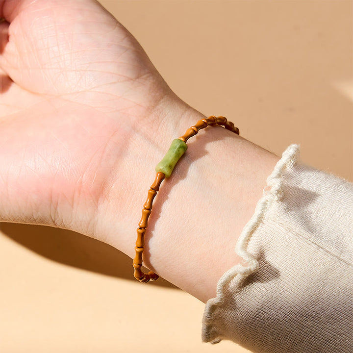 Buddha Stones Bracciale protettivo con nocciolo di oliva naturale, peridoto e design in bambù - image 5
