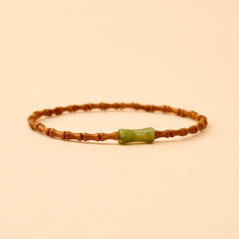 Buddha Stones Bracciale protettivo con nocciolo di oliva naturale, peridoto e design in bambù - image 4