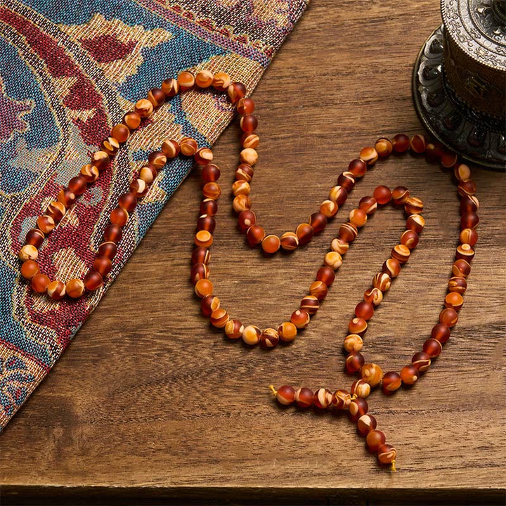 Buddha Stones 108 perle rotonde di ambra tibetana trasparente Mala anti-ansia - image 1