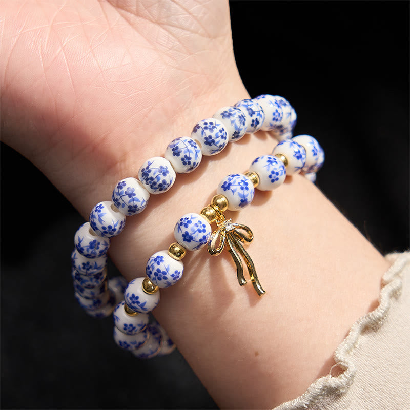Buddha Stones Braccialetto con fiocco di perline di porcellana blu, bianca e rosa, con perline, simbolo della pace interiore. - image 3