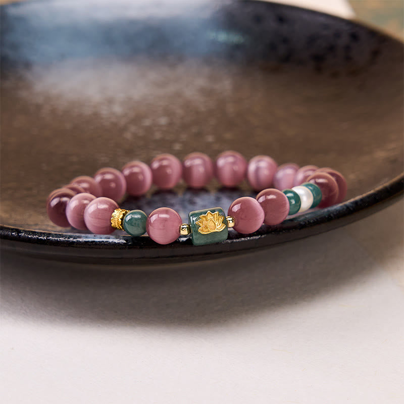Buddha Stones Braccialetto con simbolo dell'illuminazione e occhio di gatto viola e loto - image 3