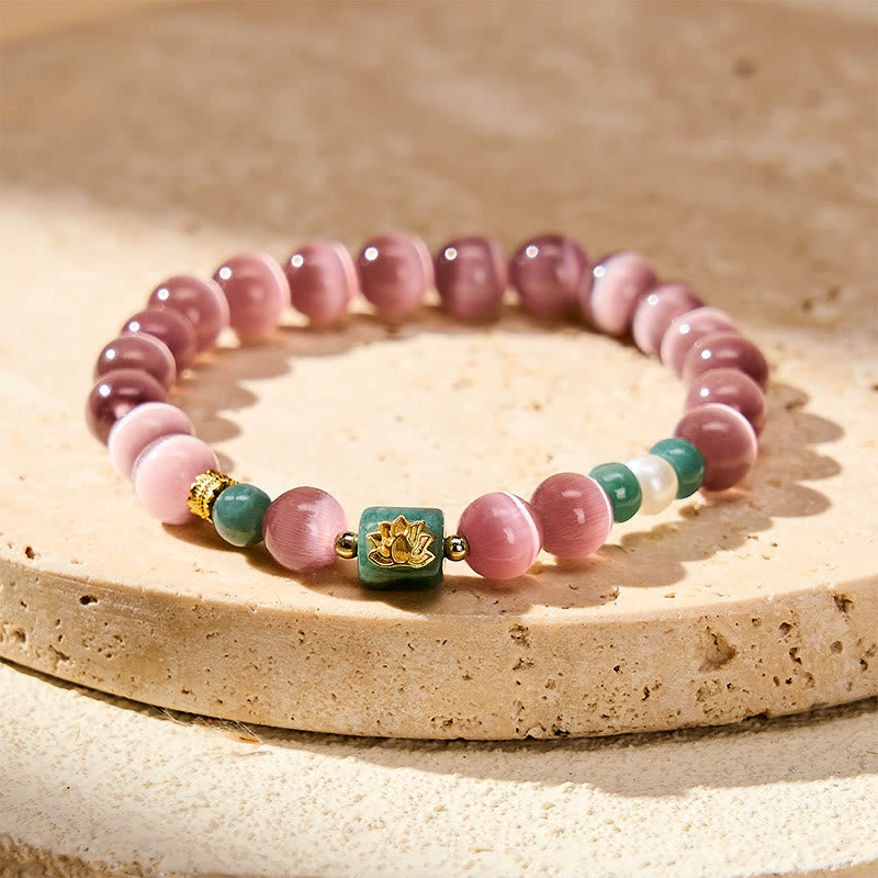 Buddha Stones Braccialetto con simbolo dell'illuminazione e occhio di gatto viola e loto - Occhio di gatto viola (circonferenza del polso 15-16 cm) - image 0
