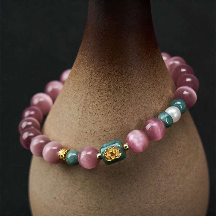 Buddha Stones Braccialetto con simbolo dell'illuminazione e occhio di gatto viola e loto - image 5