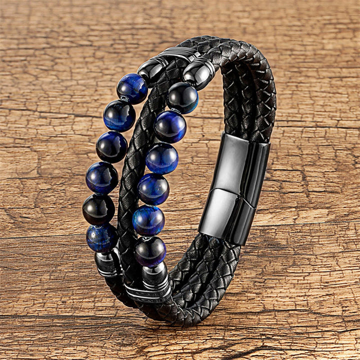 Bracciale in pelle con perle di lapislazzuli, occhio di tigre, ematite, pietra lavica, onice nero e Buddha Stones. - Occhio di tigre blu - 18-22 cm - image 0