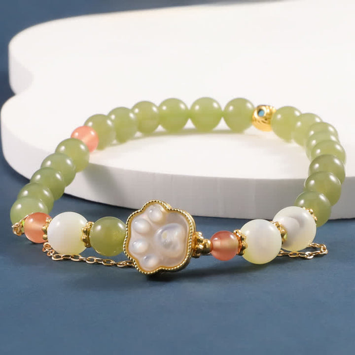 Buddha Stones Bracciale portafortuna con design a zampa di gatto in giada Hetian naturale e pietra Tridacna. - image 1