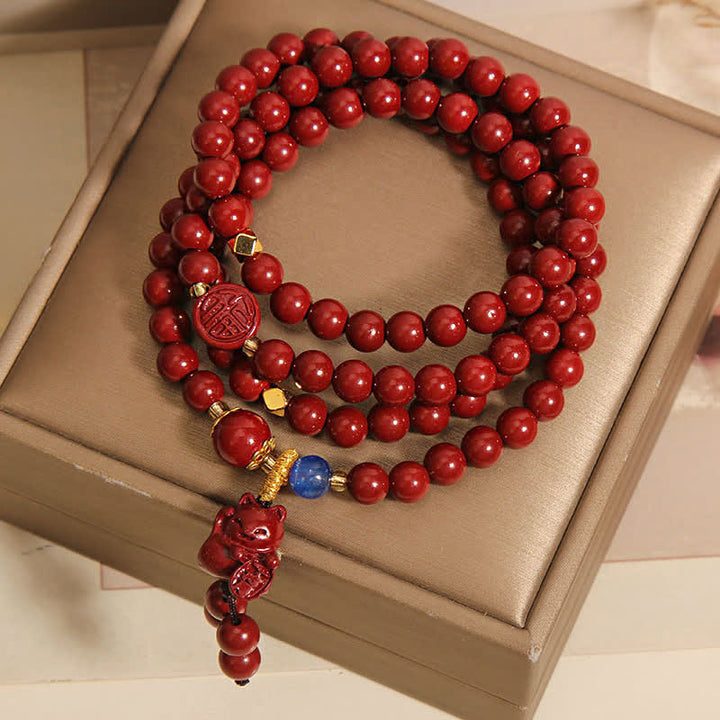 Buddha Stones Mala tibetano con 108 perle di cinabro, gatto portafortuna e personaggio Fu, simbolo della fortuna. - image 1