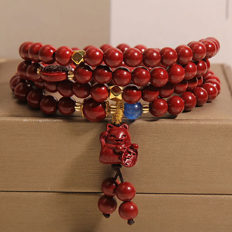 Buddha Stones Mala tibetano con 108 perle di cinabro, gatto portafortuna e personaggio Fu, simbolo della fortuna. - Cinabro (Circonferenza del polso: 16-18 cm) - image 0