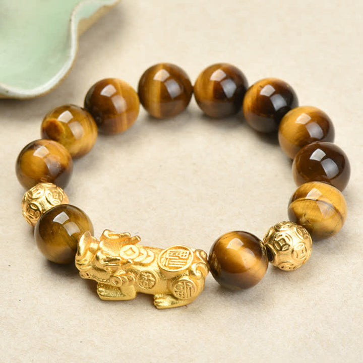 Buddha Stones Braccialetto con perline Pixiu Fu in occhio di tigre naturale, simbolo Om Mani Padme Hum, simbolo di coraggio. - Pixiu con il personaggio Fu Occhio di Tigre Giallo (Circonferenza del polso: 17–18 cm) - image 0