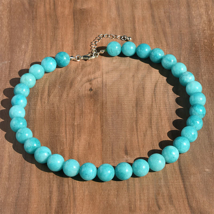 Buddha Stones Collana curativa con perle di tormalina acquamarina naturale da 12 mm - Acquamarina naturale (il colore può variare) - image 0