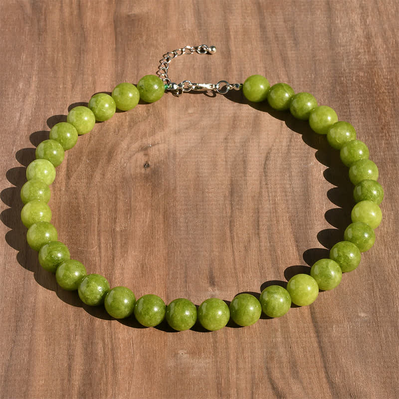 Buddha Stones Collana curativa con perle di tormalina acquamarina naturale da 12 mm - Peridoto naturale (il colore può variare) - image 11
