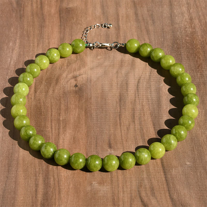Buddha Stones Collana curativa con perle di tormalina acquamarina naturale da 12 mm - Peridoto naturale (il colore può variare) - image 11