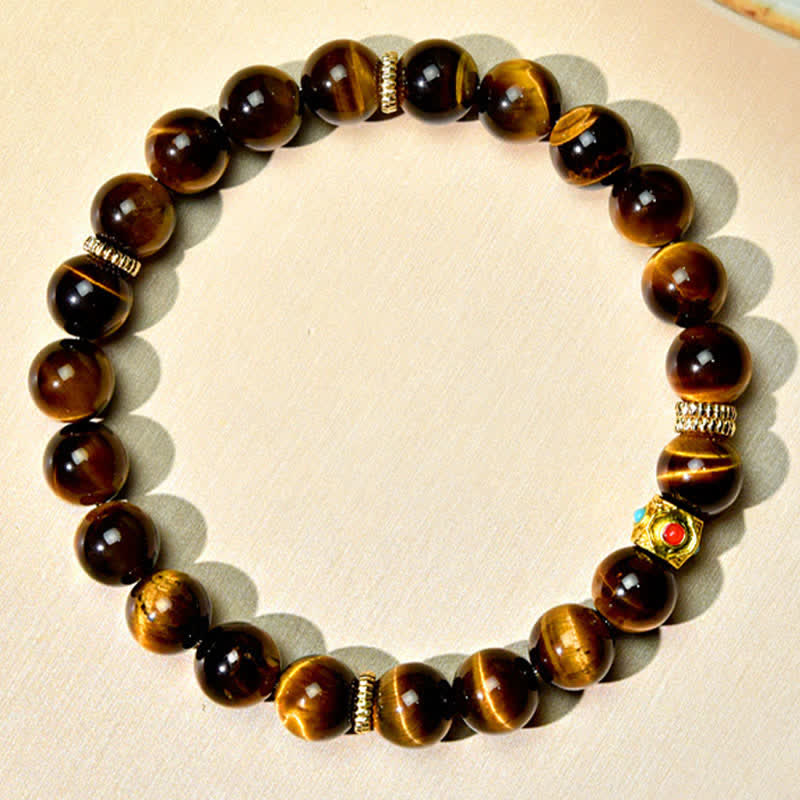 Buddha Stones Bracciale rinforzante con perle naturali occhio di tigre del Tibet - image 1