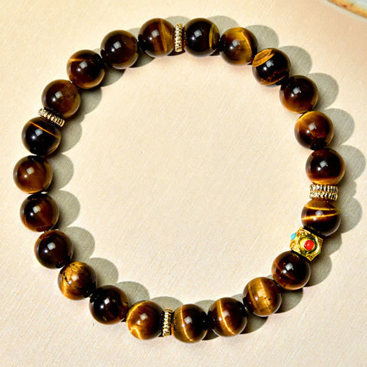 Buddha Stones Bracciale rinforzante con perle naturali occhio di tigre del Tibet - image 1