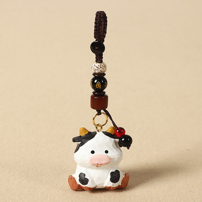 Buddha Stones Portachiavi in ​​legno di tiglio inciso con zodiaco cinese, fiore di pruno, pace e sicurezza, Om Mani Padme Hum, simbolo positivo. - Ox 4cm (Colore, forma e dimensioni possono variare) - Om Mani Padme Hum - image 10
