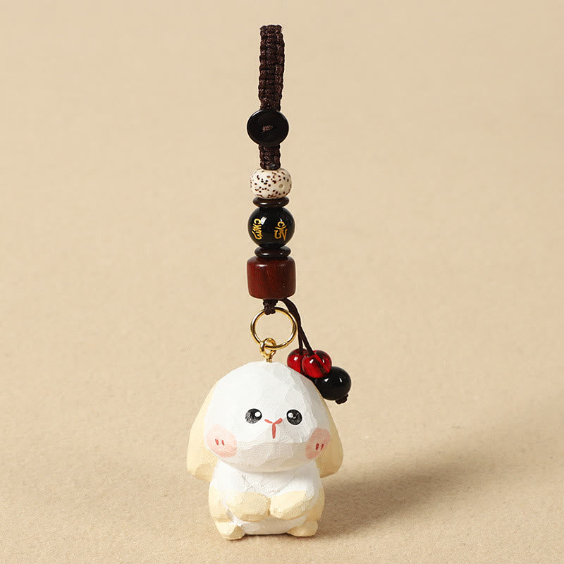 Buddha Stones Portachiavi in ​​legno di tiglio inciso con zodiaco cinese, fiore di pruno, pace e sicurezza, Om Mani Padme Hum, simbolo positivo. - Coniglio di 4 cm (colore, forma e dimensioni possono variare) - Om Mani Padme Hum - image 16