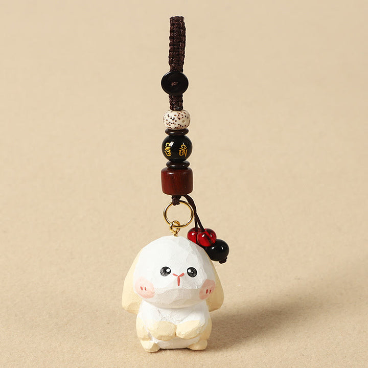 Buddha Stones Portachiavi in ​​legno di tiglio inciso con zodiaco cinese, fiore di pruno, pace e sicurezza, Om Mani Padme Hum, simbolo positivo. - Coniglio di 4 cm (colore, forma e dimensioni possono variare) - Om Mani Padme Hum - image 16