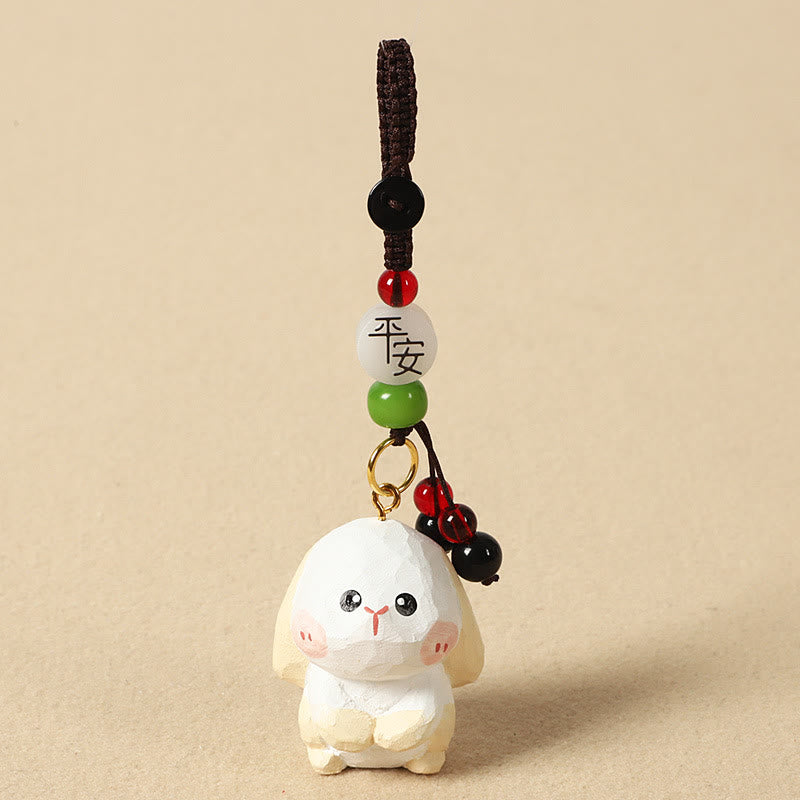 Buddha Stones Portachiavi in ​​legno di tiglio inciso con zodiaco cinese, fiore di pruno, pace e sicurezza, Om Mani Padme Hum, simbolo positivo. - Coniglio di 4 cm (colore, forma e dimensioni possono variare) - Pace e sicurezza - image 18