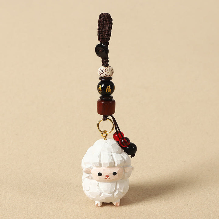 Buddha Stones Portachiavi in ​​legno di tiglio inciso con zodiaco cinese, fiore di pruno, pace e sicurezza, Om Mani Padme Hum, simbolo positivo. - Capra 4 cm (colore, forma e dimensioni possono variare) - Om Mani Padme Hum - image 26