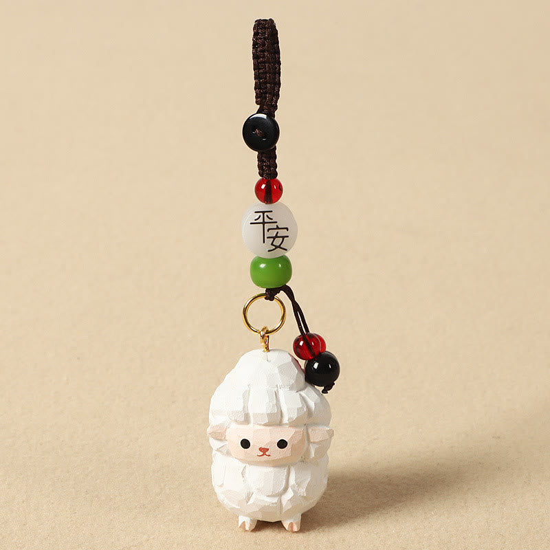 Buddha Stones Portachiavi in ​​legno di tiglio inciso con zodiaco cinese, fiore di pruno, pace e sicurezza, Om Mani Padme Hum, simbolo positivo. - Capra 4 cm (colore, forma e dimensioni possono variare) - Pace e sicurezza - image 28