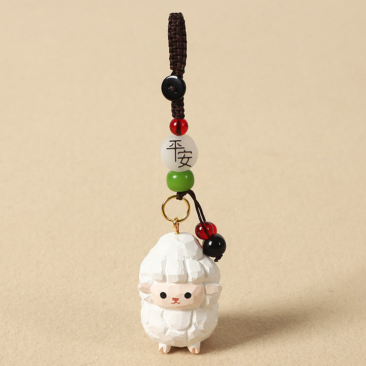 Buddha Stones Portachiavi in ​​legno di tiglio inciso con zodiaco cinese, fiore di pruno, pace e sicurezza, Om Mani Padme Hum, simbolo positivo. - Capra 4 cm (colore, forma e dimensioni possono variare) - Pace e sicurezza - image 28