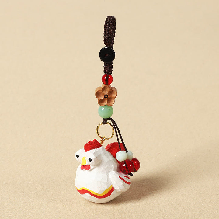 Buddha Stones Portachiavi in ​​legno di tiglio inciso con zodiaco cinese, fiore di pruno, pace e sicurezza, Om Mani Padme Hum, simbolo positivo. - Gallo di 4 cm (colore, forma e dimensioni possono variare) - Fiore di pruno - image 33