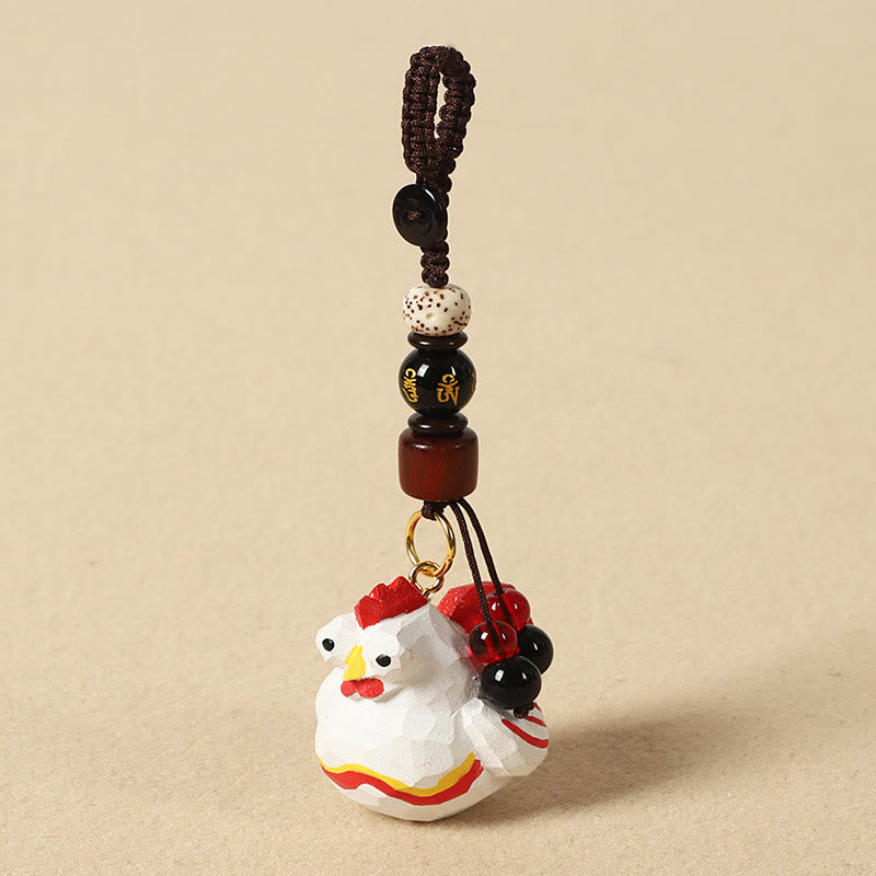 Buddha Stones Portachiavi in ​​legno di tiglio inciso con zodiaco cinese, fiore di pruno, pace e sicurezza, Om Mani Padme Hum, simbolo positivo. - Gallo di 4 cm (colore, forma e dimensioni possono variare) - Om Mani Padme Hum - image 32