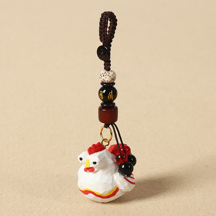 Buddha Stones Portachiavi in ​​legno di tiglio inciso con zodiaco cinese, fiore di pruno, pace e sicurezza, Om Mani Padme Hum, simbolo positivo. - Gallo di 4 cm (colore, forma e dimensioni possono variare) - Om Mani Padme Hum - image 32