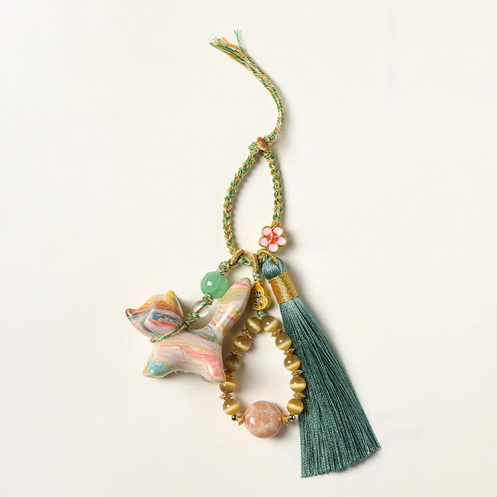 Buddha Stones Portachiavi a forma di mini volpe in legno d'ebano laccato, con motivo pace. - image 1