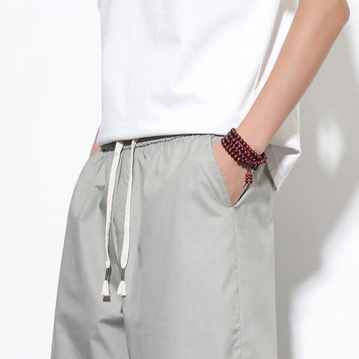 Buddha Stones Pantaloni harem da uomo estivi casual in cotone tinta unita con coulisse e spacchi laterali, con tasche. - image 28